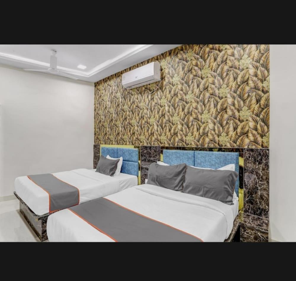 Hotel Bhavya Residency Αχμπανταμπάντ Δωμάτιο φωτογραφία